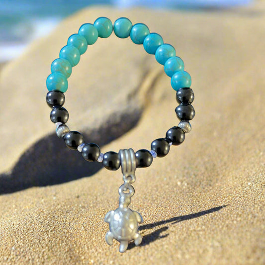 Black onyx bracelet with dyed howlite and turtle charm