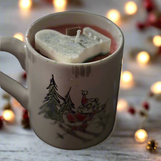 Holiday mug candle with stocking decoration