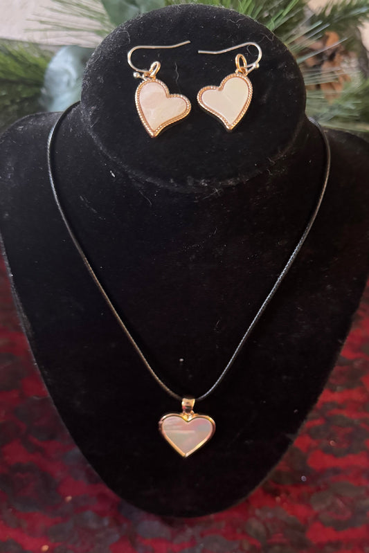 necklace with heart pendant and hook earrings with hearts